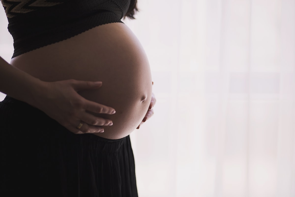 Pregnant person consulting about safety